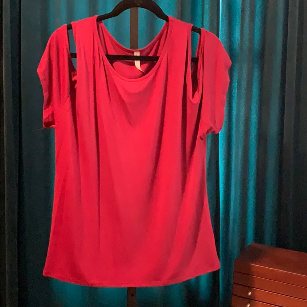 Isaac Lieve open shoulder red off shoulder top.
